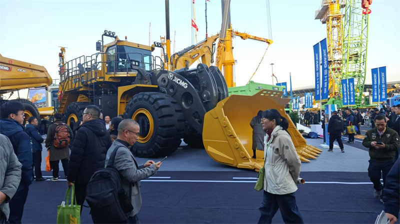 the company's booth was crowded with people the company's booth was crowded with people