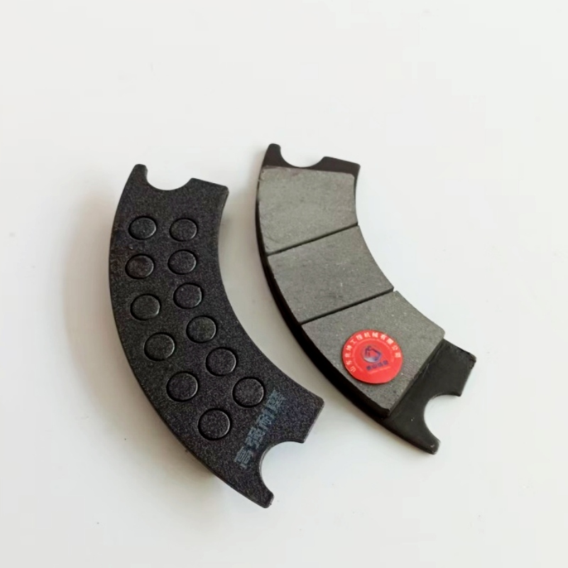 Pièces pour chargeuse sur pneus : plaquettes de frein